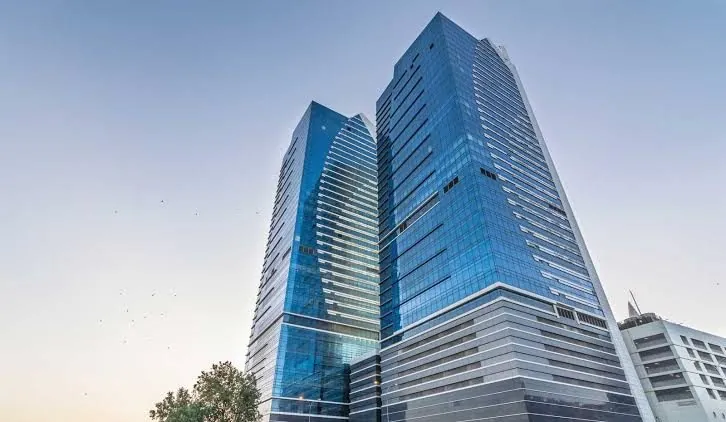 Sky Tower Dolmen logo or building, Karachi